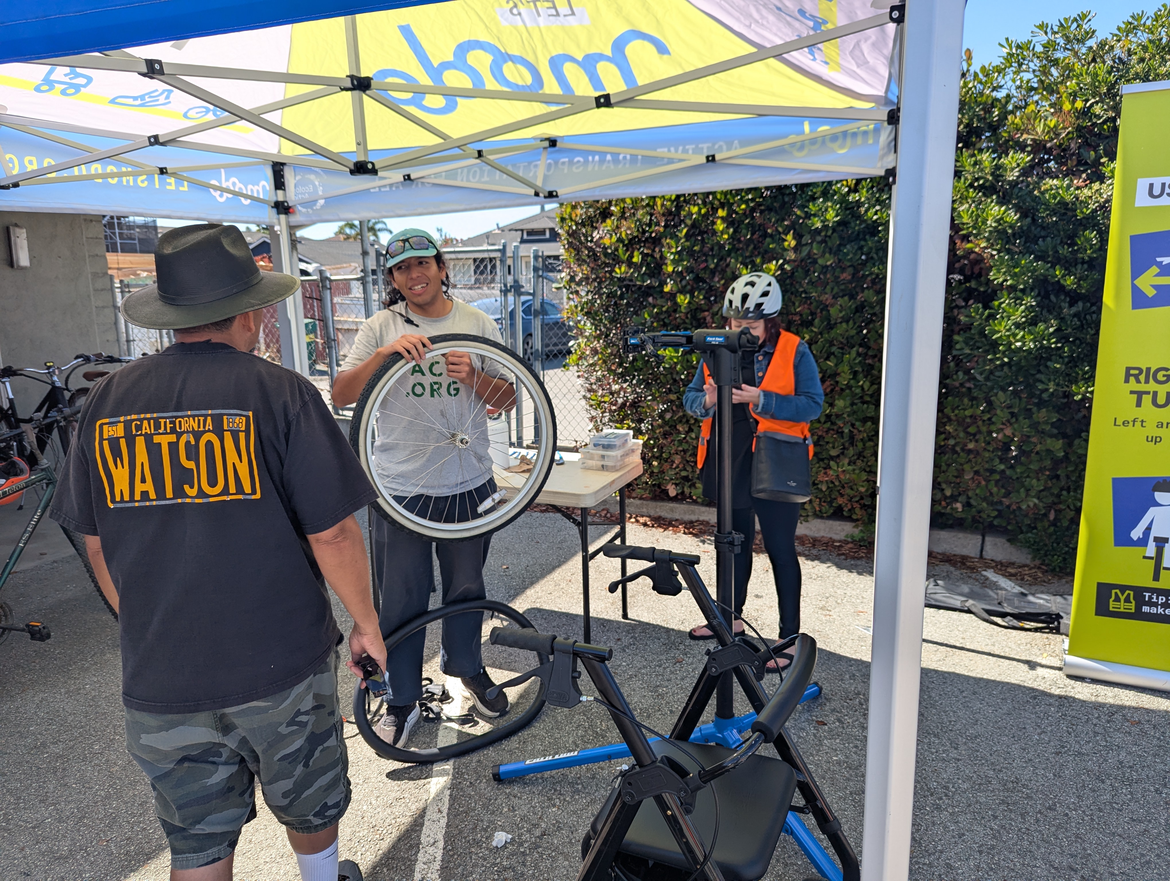 Bike repair at Modo booth as part of one of the events for Earth Week of Climate Action.